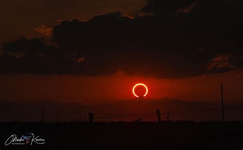 A partial solar eclipse of the sun, the first stage of a rare “ring of fire” eclipse, is now visible over the Americas